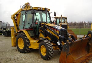 Koparko-ładowarka Caterpillar 428E — Koparki Kraska Szczecin